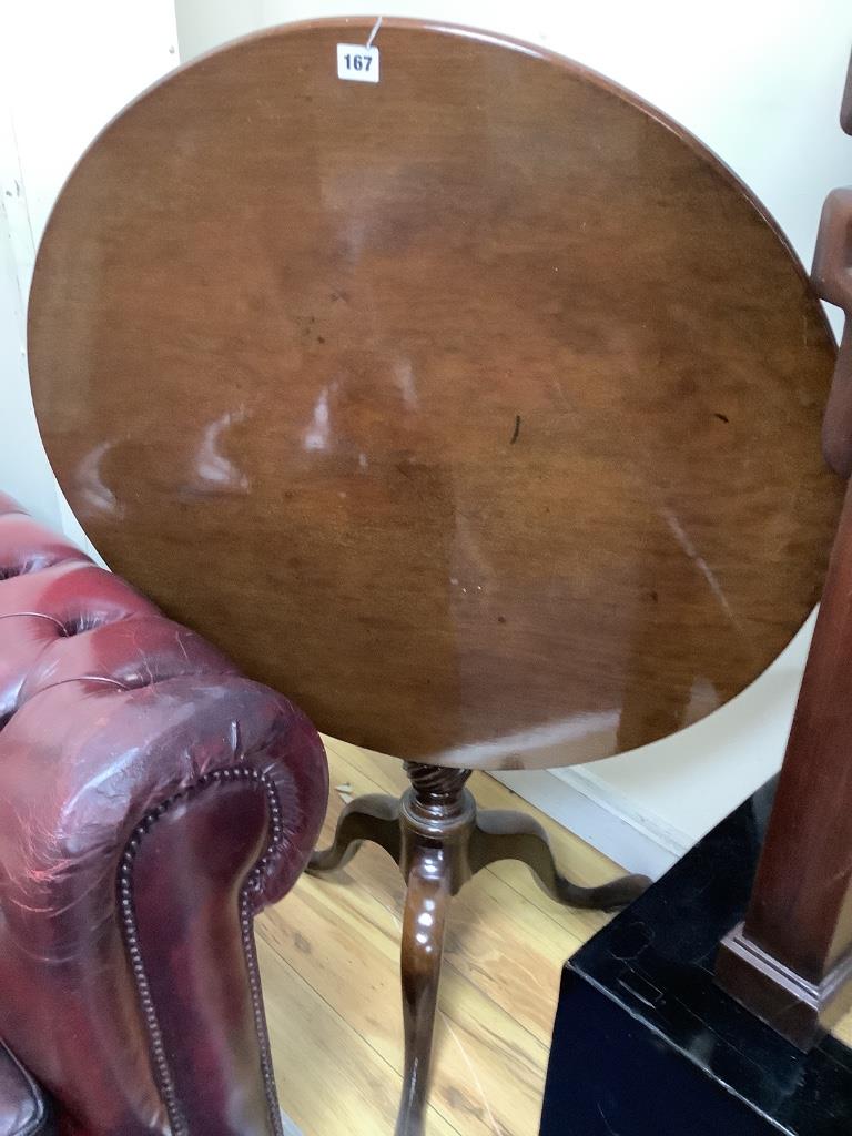 A Georgian style circular mahogany pedestal table, on tripod base, diameter 78cm height 73cm